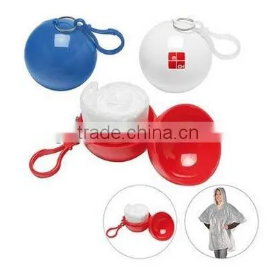 Portable golf ball style golf poncho