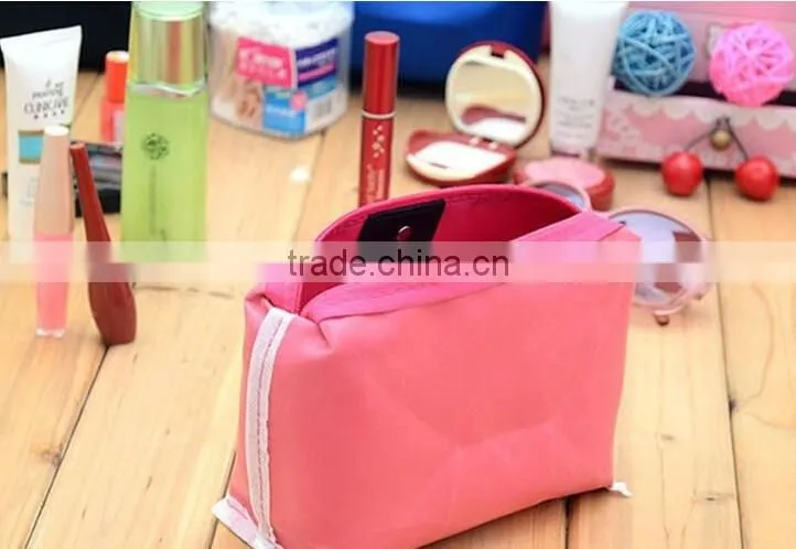 YIWU RODA 100%nylon multicolor optional dumpling shape cosmetic bag