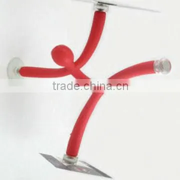 TPR q-man magnet toy
