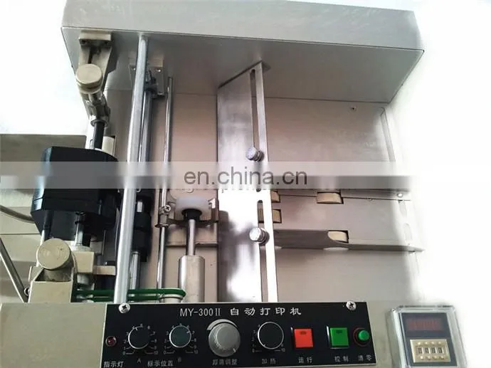 MY-300 automatic batch/lot/series number expiry date embossing printing machine for plastic bags/aluminum foil