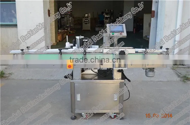 Shanghai BY-TB100 Automatic adhesive bottle labeling machine,labeling machine for canned food,bottle labeling machine price