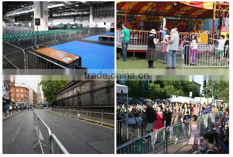 road barricade or pedestrian barrier/metal crowd control barrier at riot/event for crowd control