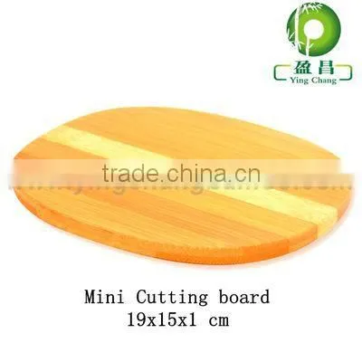 Oval bamboo flexible cutting board