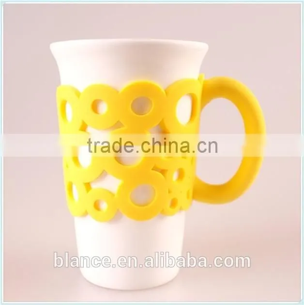 ceramic coffee mug with unique handle in silicone