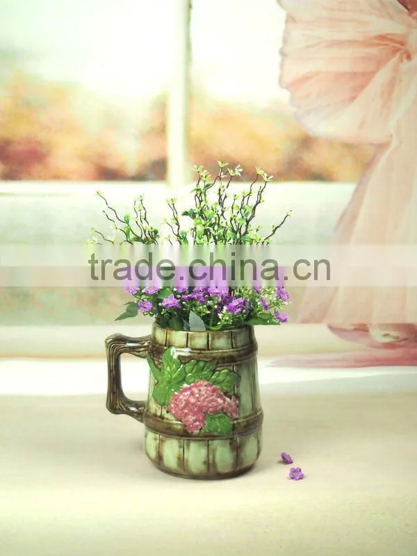 ceramic handle vase with flower design