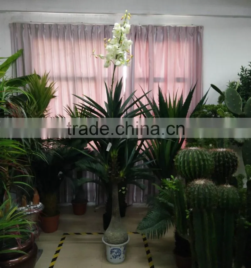 artificial green plant with flower for decoration
