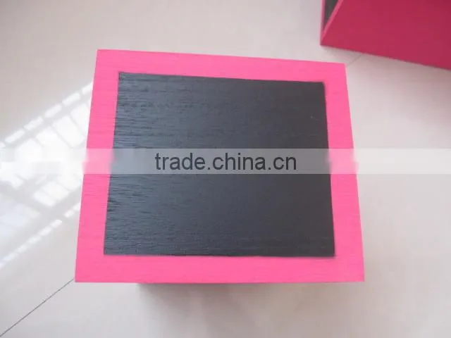 colorful wooden boxes with black board