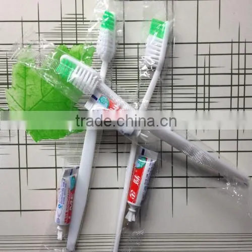 Transparent hotel toothbrush disposable toothbrush with toothpaste