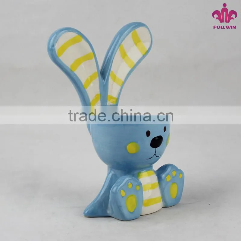 Ceramic egg holder with rabbit design