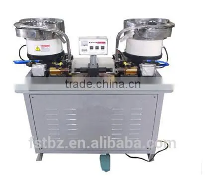 Automatic earlug spot welder for chemcial cans