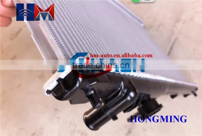 Alumnium radiator 2003 OEM FS7P15200C ALumnium or Alumnium plastic