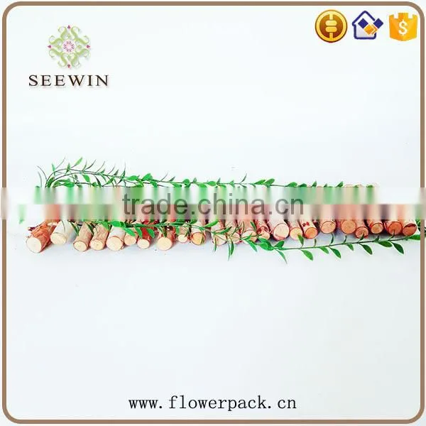 The birch stick is decorated in the garden