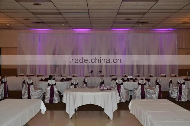 fancy and elegant pipe and drape wedding backdrop