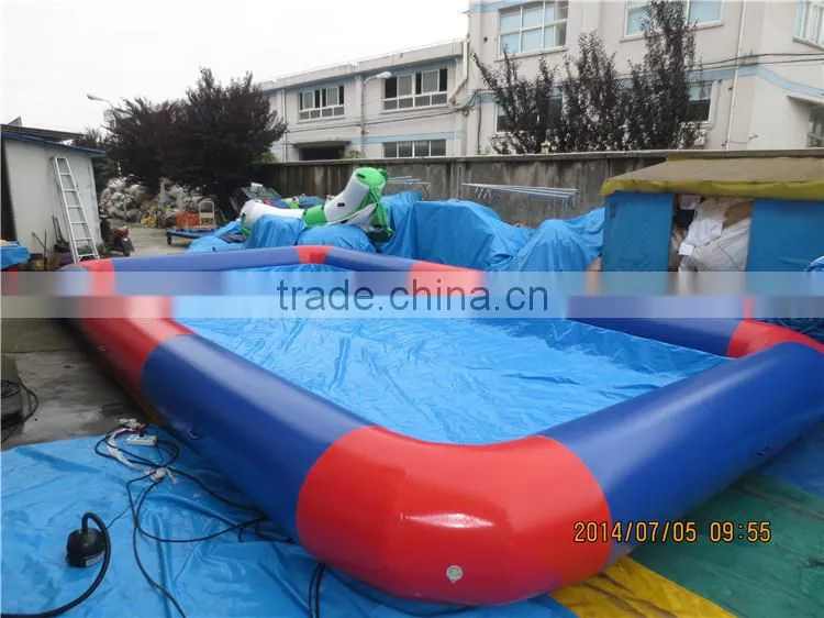 Low price floating inflatable boat swimming pool for sale