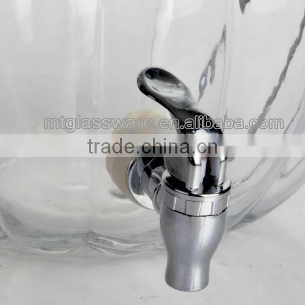 the glass pumpkin shaped beverage dispenser with metal stand
