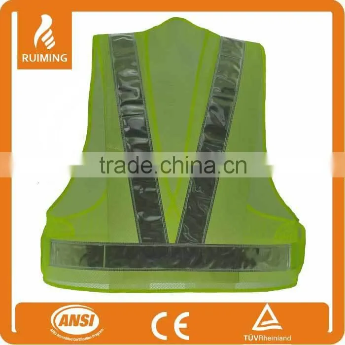 Traffic safety vest with high visibility reflective tape