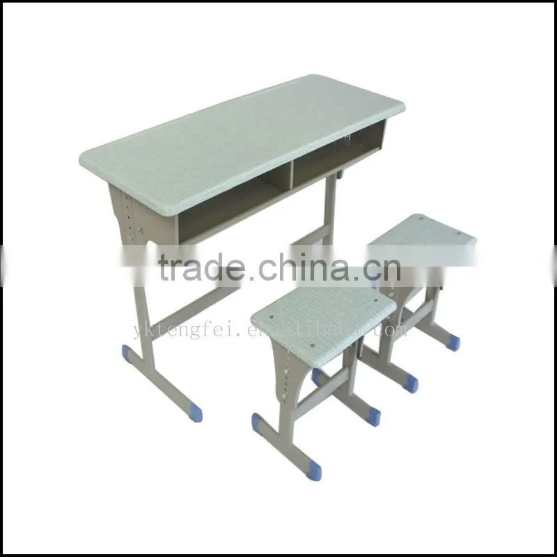 Adjustable double school desk and stool set, moulded pressing table