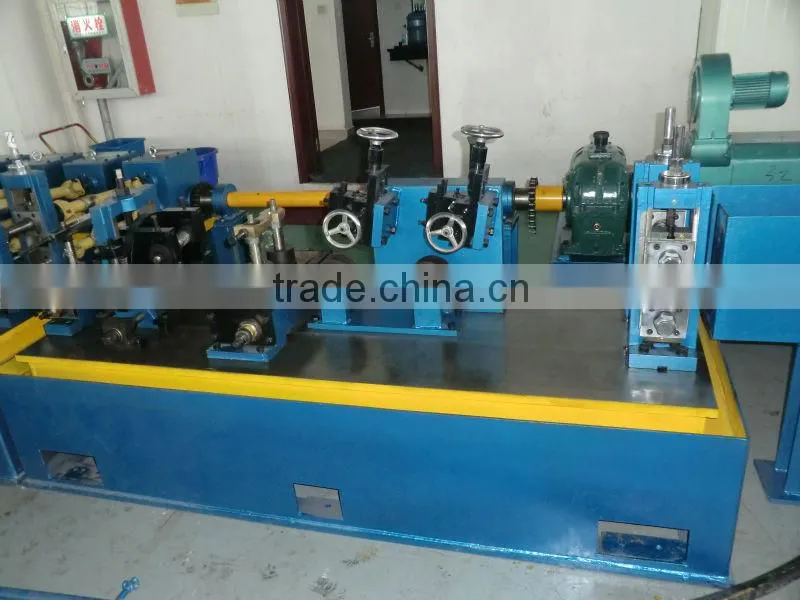 Welded tube cutting machine