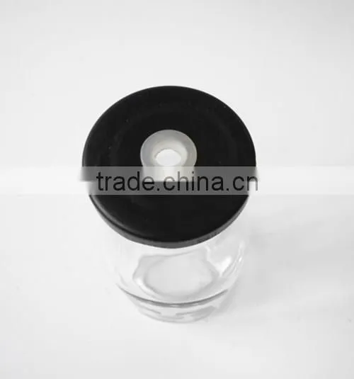 black skull head decorate glass bottle for juice or liquior with metal lid straw