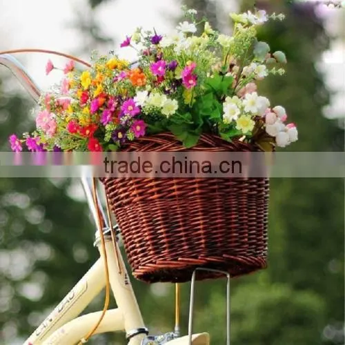 brown colored wicker bicycle bike basket in front bike