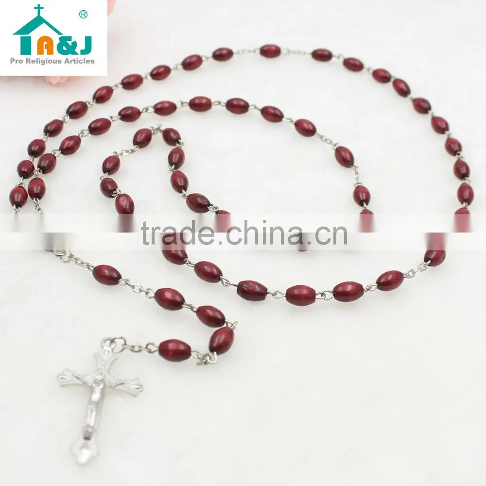 Dark brown oval wooden bead Jesus rosary