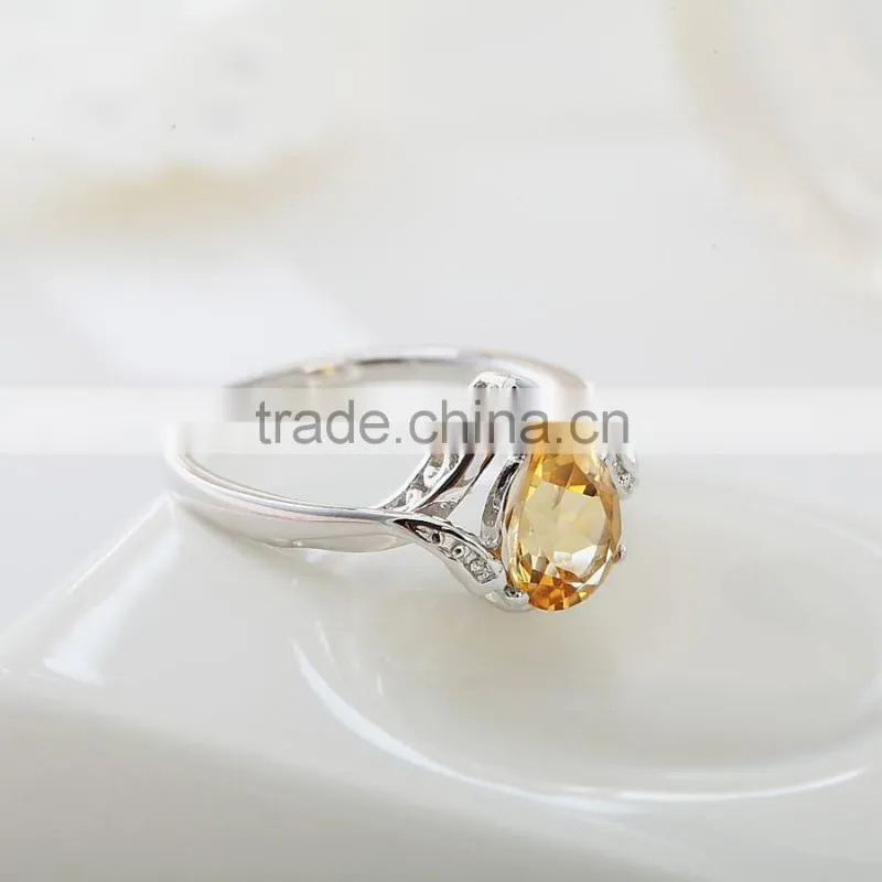 Charming pear shape citrine stone with 925 sterling silver ring. Beautiful 925 sterling silver gemstone ring