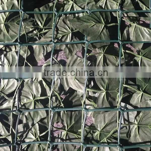 Dark green artificial ivy fence for garden decoration