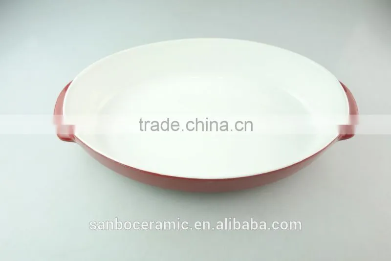 red oval shape ceramic bakeware porcelain bake plate with hands in stocklots
