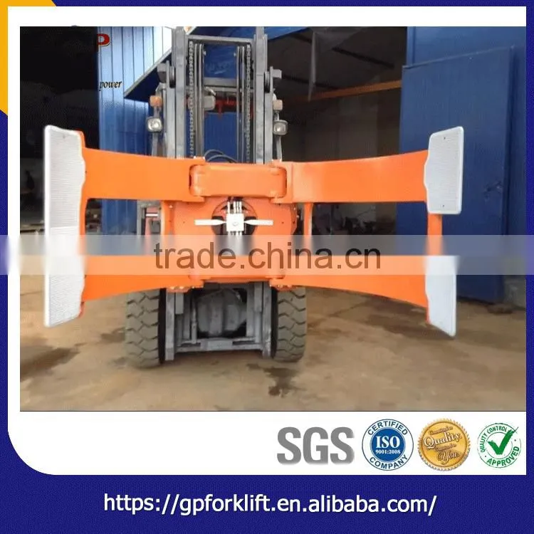 Rapidly rotating forklift paper roll clamp