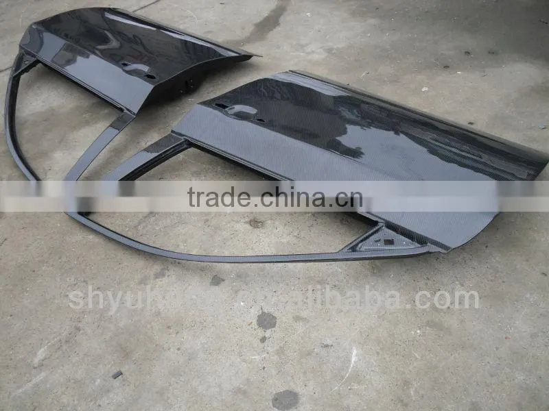 carbon fiber door before and after for GRB STI