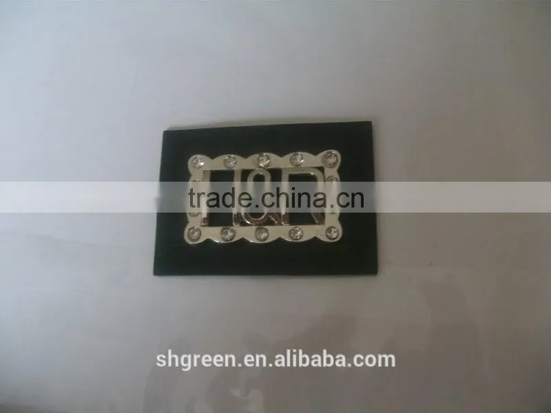 Promotional white real leather label with engraved logo metal plate