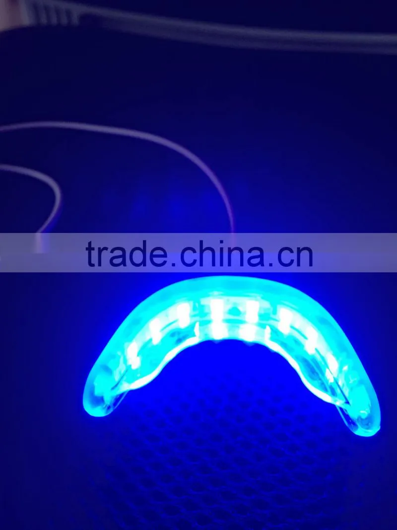 Datahero 16 LED cold light teeth whitening machine using on the phone