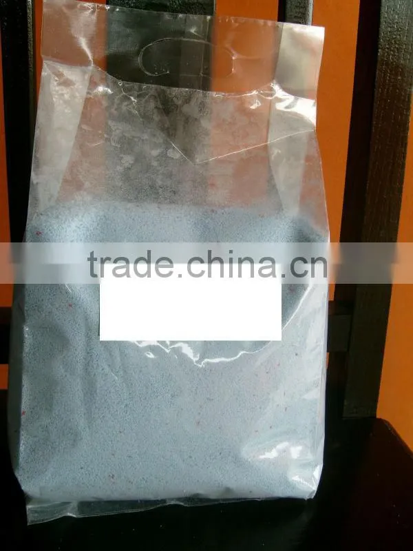 blue industrial detergent powder in bulk package