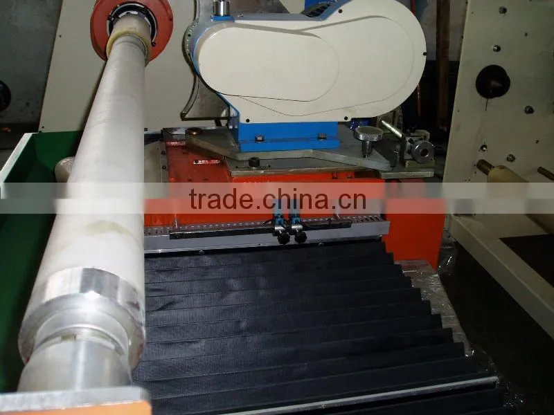 Jumbo roll single shaft tape films cutting machine