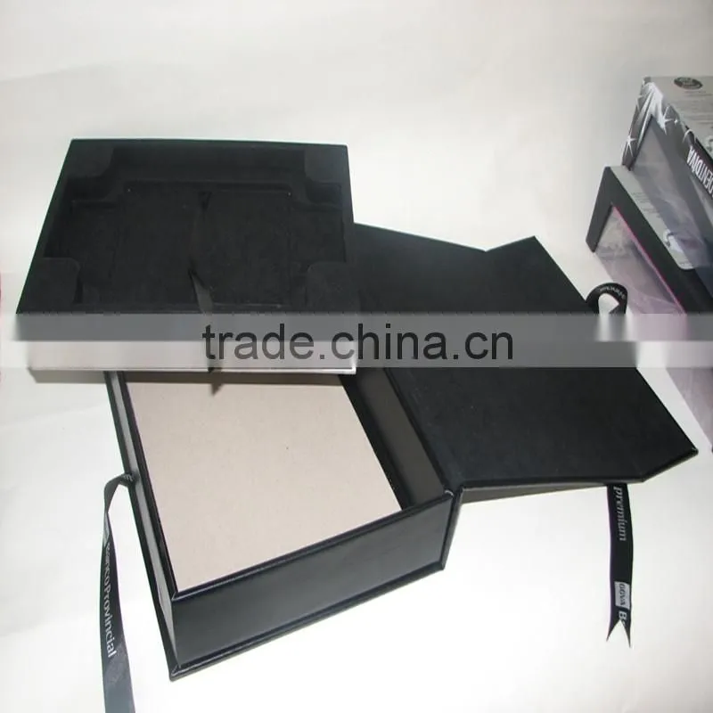 black box with CMYK printing and gold logo lamination and ribbon