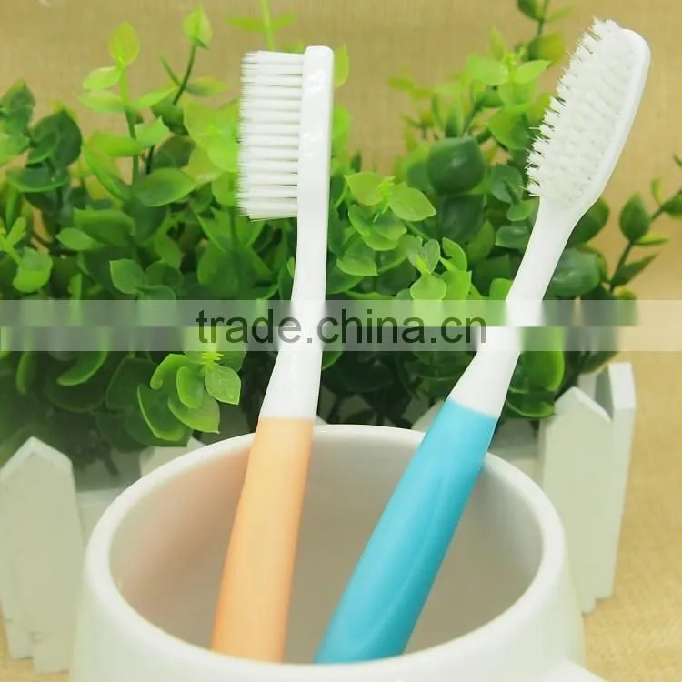 Dupont nylon rounded bristle Long rubber handle adult toothbrush
