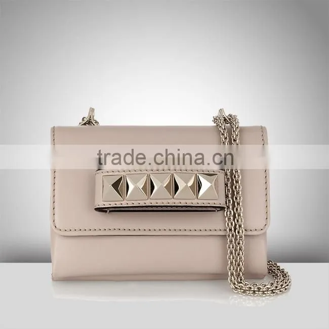 S034 Latest first class PU clutch Bags with Pyramid Studs Shoulder strap Handbags Factory
