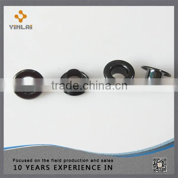 Decorative metal shoe eyelet