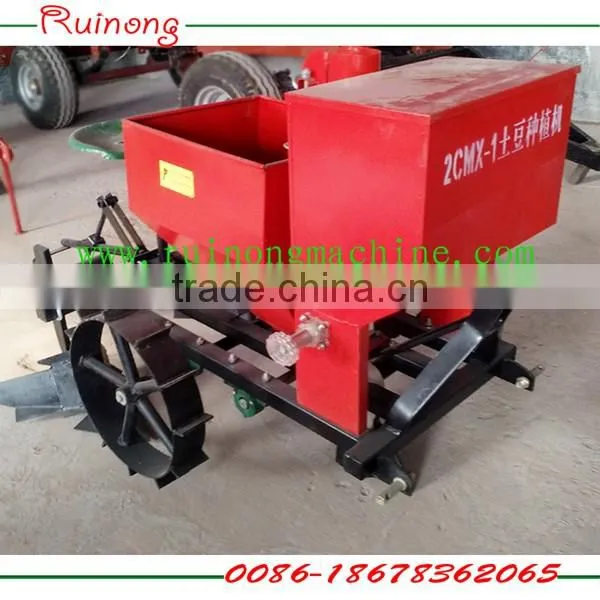 Three point mounted walking tractor matched cups potato planter