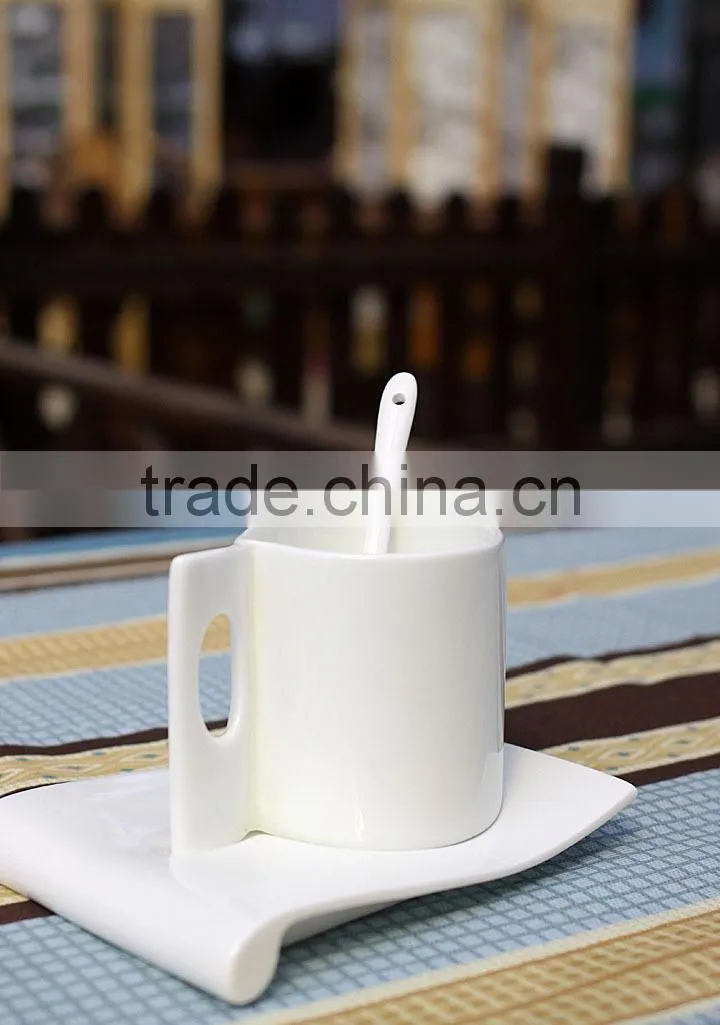 White porcelain ceramic coffee mug with saucer