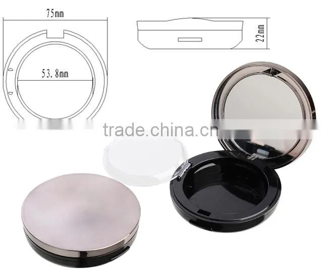Empty round makeup powder container with mirror