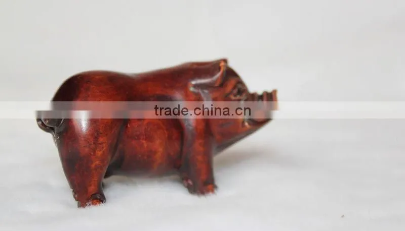 Artistic sandalwood carving pig