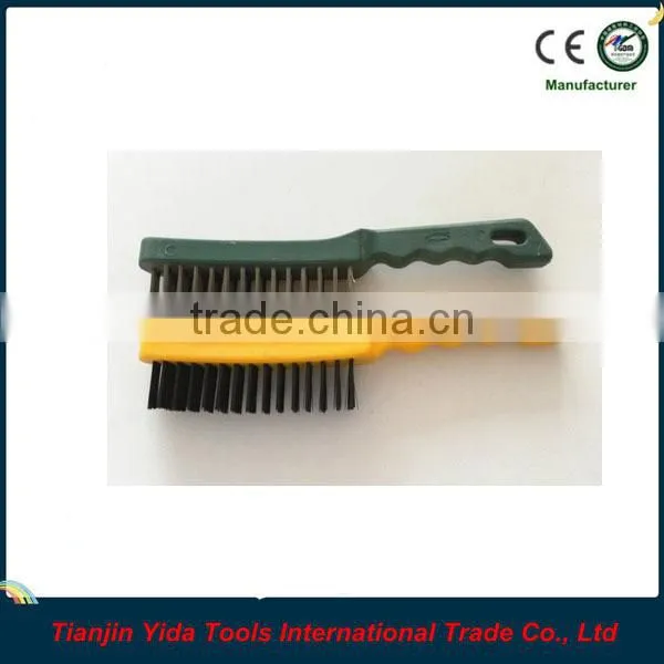 black wire brush with plastic handle