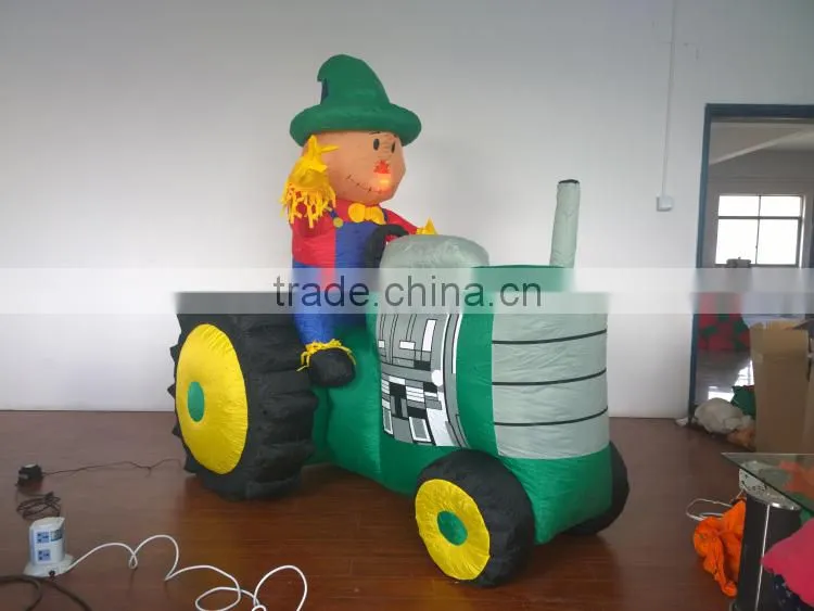 Animated Inflatable Farmer/Peasant Toy on Green Tractor with Yellow Wheels