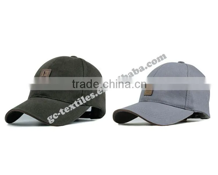 sandwich cotton twill fabric with embossed brown rubber badge logo on front and velcro back sports baseball caps