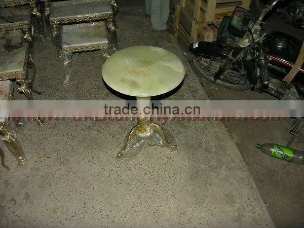 Natural color dark green onyx table