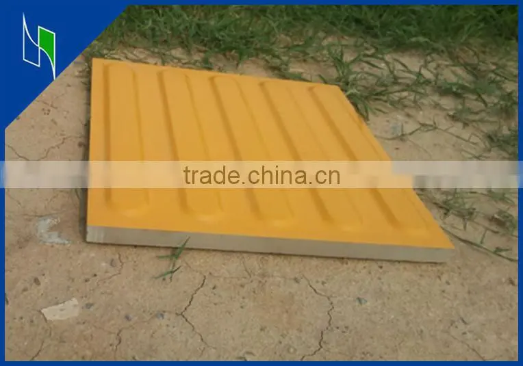 yellow tactile flooring tile