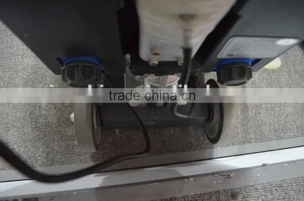 Hand held carpet washing machine
