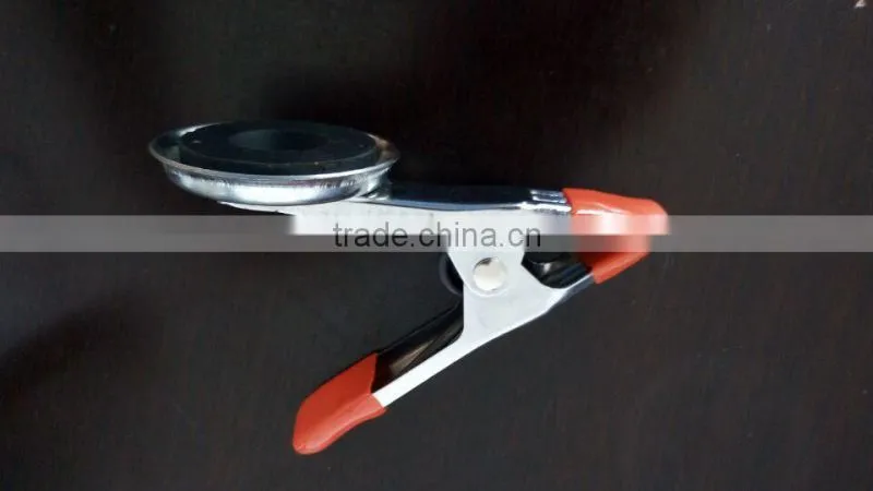 A shape round magnetic metal clamp pinch cock with rubber coated