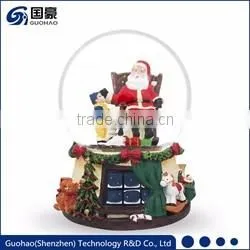 Regal Santa statue and Sledding Santa Figurine